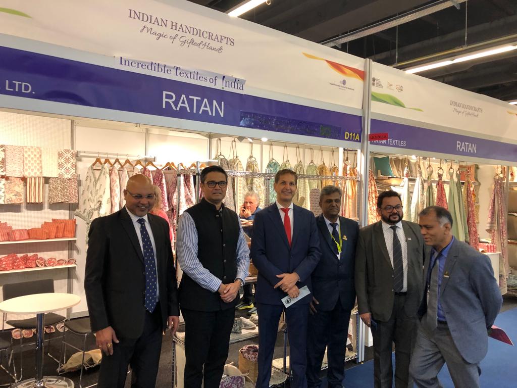 Shri Vinod Kumar Consul (Comm) along with Sh. Rajesh Satam, Joint Director, TEXPROCIL greeting Sh Sunit Jain, Ratan Textiles at their stall in Heimtextil 2023